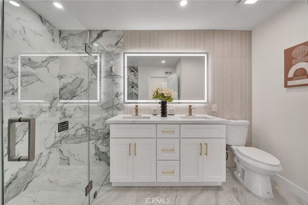 Bathroom, Dual Sink Vanities, Glass Shower, Interior, Marble, Marble Walls, Recessed Lighting