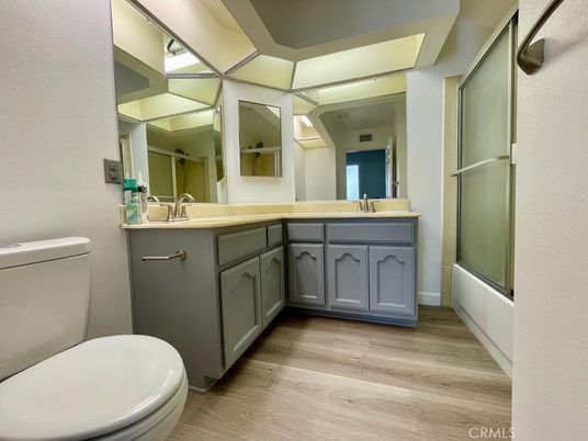Bathroom, Dual Sink Vanities, Glass Shower, Interior, Wood Texture Flooring