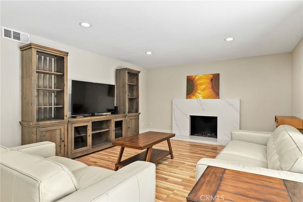 Fireplace, Interior, Living room, Recessed Lighting, Wood Texture Flooring