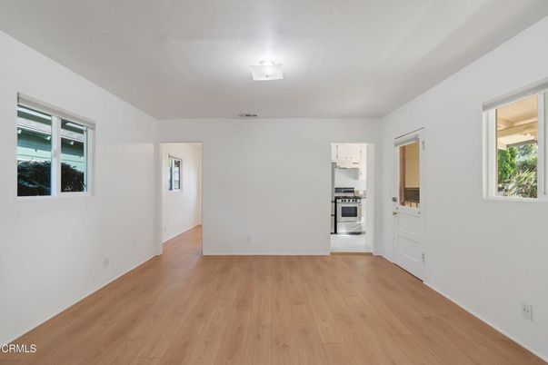 Empty room, Interior, Kitchen, Stainless Steel Appliances, Wood Texture Flooring