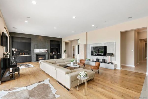 Fireplace, Interior, Living room, Piano, Recessed Lighting, Wood Texture Flooring