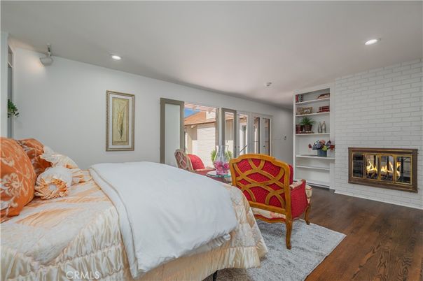 Bedroom, Fireplace, Interior, Recessed Lighting, Wood Texture Flooring