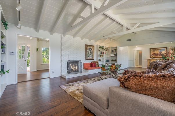 Fireplace, Interior, Living room, Recessed Lighting, Stone Walls, Wood Texture Flooring
