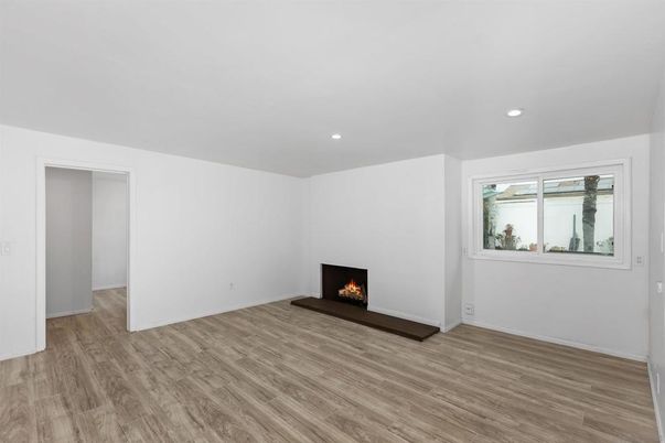 Empty room, Fireplace, Interior, Recessed Lighting, Wood Texture Flooring