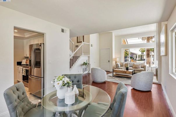 Dining room, Interior, Kitchen, Living room, Recessed Lighting, Stainless Steel Appliances, Wood Texture Flooring