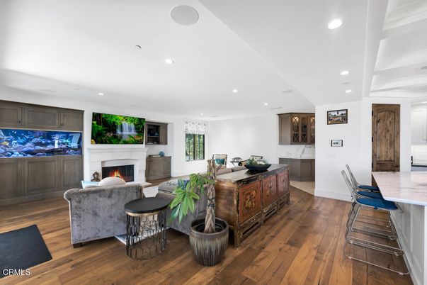Fireplace, Interior, Living room, Recessed Lighting, Wood Texture Flooring
