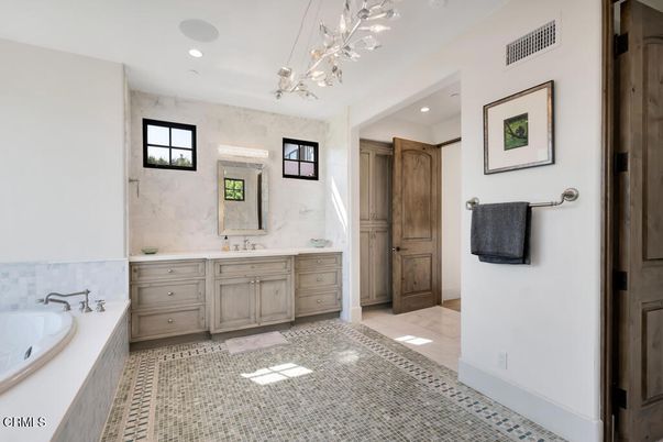 Bathroom, Dual Sink Vanities, Interior, Marble Walls, Pendant Lights, Recessed Lighting