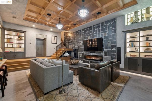 Fireplace, Interior, Living room, Pendant Lights, Recessed Lighting, Stone Walls, Wooden Ceilings