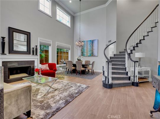Chandelier, Dining room, Fireplace, Interior, Living room, Pendant Lights, Wood Texture Flooring