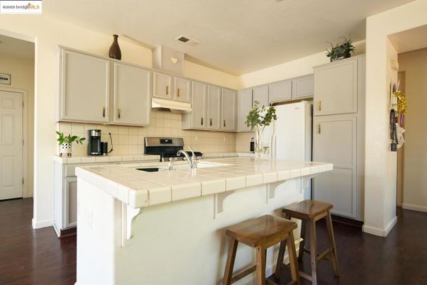 Interior, Kitchen, Tile Countertops, Wood Texture Flooring