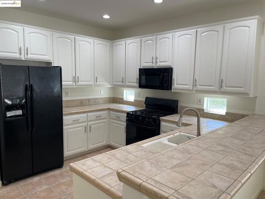 Interior, Kitchen, Recessed Lighting, Tile Countertops