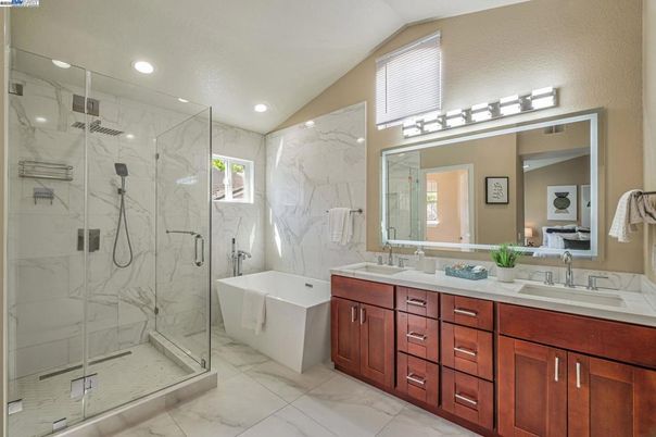 Bathroom, Dual Sink Vanities, Free Standing Baths, Glass Shower, Interior, Marble, Marble Walls, Recessed Lighting
