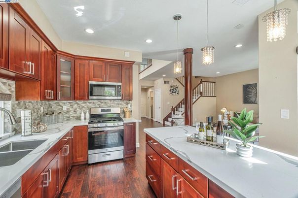 Interior, Kitchen, Pendant Lights, Recessed Lighting, Stainless Steel Appliances, Wood Texture Flooring