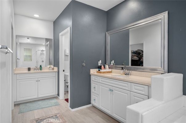 Bathroom, Dual Sink Vanities, Interior, Recessed Lighting, Wood Texture Flooring