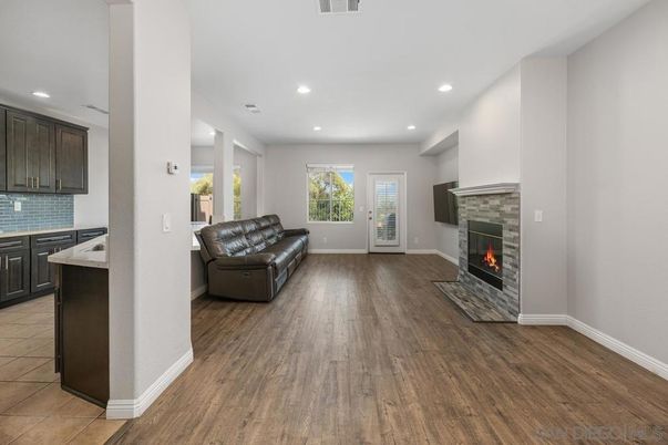 Fireplace, Interior, Kitchen, Recessed Lighting, Wood Texture Flooring