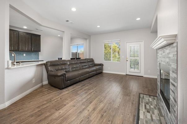 Fireplace, Interior, Kitchen, Living room, Recessed Lighting, Wood Texture Flooring