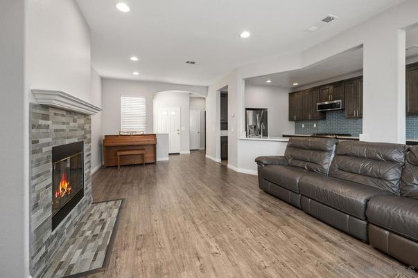 Fireplace, Interior, Kitchen, Living room, Recessed Lighting, Wood Texture Flooring