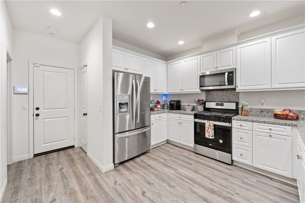 Interior, Kitchen, Recessed Lighting, Stainless Steel Appliances, Wood Texture Flooring