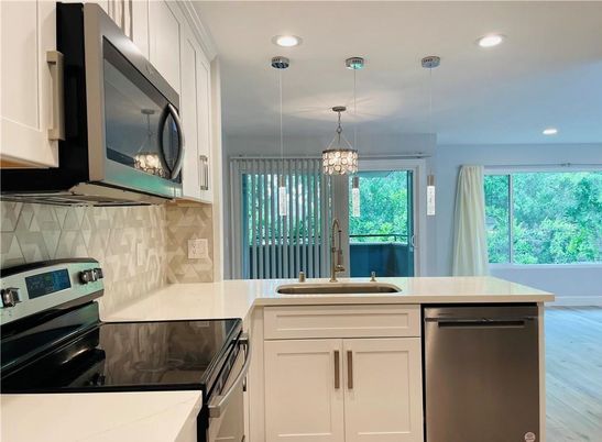 Interior, Kitchen, Pendant Lights, Recessed Lighting, Stainless Steel Appliances, Wood Texture Flooring