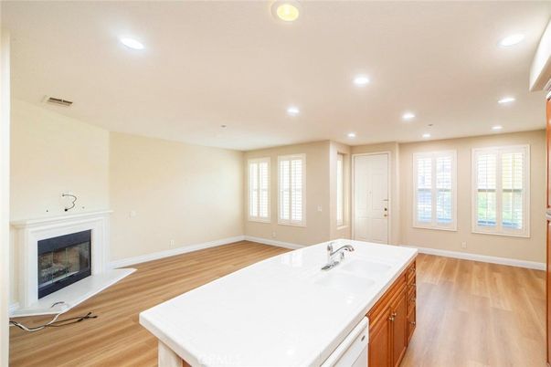 Empty room, Fireplace, Interior, Recessed Lighting, Wood Texture Flooring