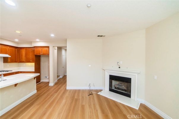 Fireplace, Interior, Kitchen, Recessed Lighting, Wood Texture Flooring