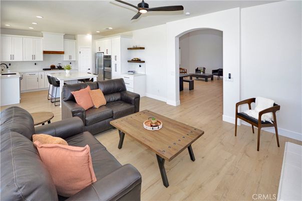 Dining room, Interior, Kitchen, Living room, Recessed Lighting, Stainless Steel Appliances, Wood Texture Flooring