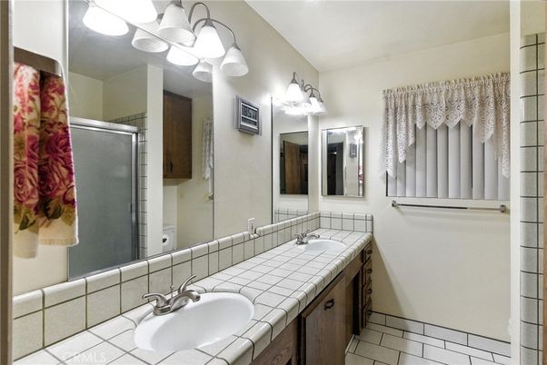 Bathroom, Dual Sink Vanities, Glass Shower, Interior, Tile Countertops
