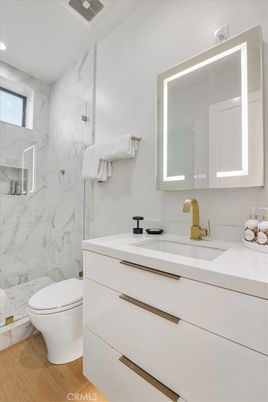Bathroom, Glass Shower, Interior, Marble Walls, Recessed Lighting, Wood Texture Flooring