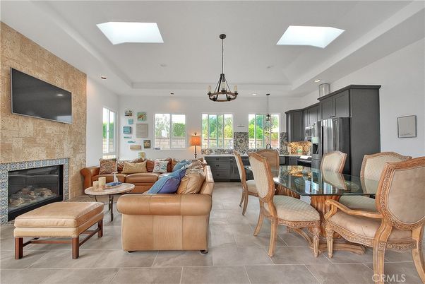 Dining room, Fireplace, Interior, Kitchen, Living room, Pendant Lights, Recessed Lighting, Stainless Steel Appliances, Stone Walls