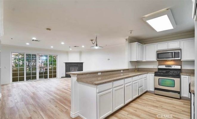 Fireplace, Interior, Kitchen, Pendant Lights, Recessed Lighting, Stainless Steel Appliances, Wood Texture Flooring