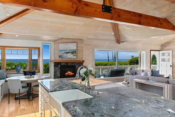 Dining room, Fireplace, Interior, Kitchen, Living room, Recessed Lighting, Stone Walls, Water, Wooden Beams, Wooden Ceilings, Wood Texture Flooring