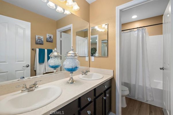 Bathroom, Dual Sink Vanities, Interior, Recessed Lighting, Wood Texture Flooring