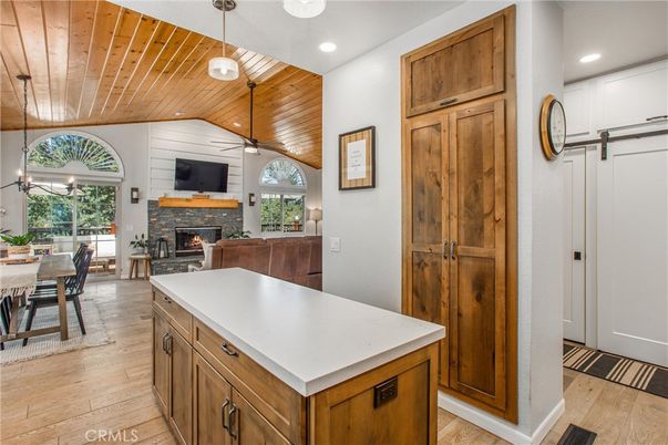 Dining room, Fireplace, Interior, Kitchen, Pendant Lights, Recessed Lighting, Wooden Ceilings, Wood Texture Flooring