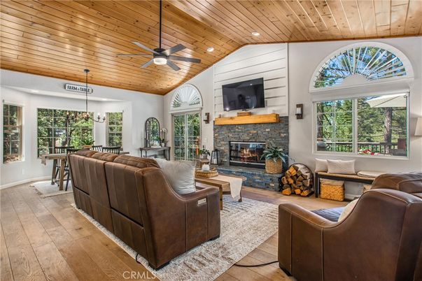 Dining room, Fireplace, Interior, Living room, Pendant Lights, Recessed Lighting, Wooden Ceilings, Wood Texture Flooring