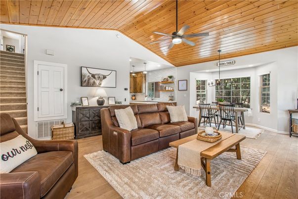 Chandelier, Dining room, Interior, Kitchen, Living room, Pendant Lights, Recessed Lighting, Wooden Ceilings, Wood Texture Flooring