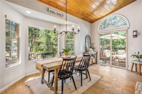 Chandelier, Dining room, Interior, Pendant Lights, Recessed Lighting, Wooden Ceilings, Wood Texture Flooring