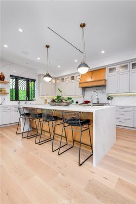 Interior, Kitchen, Marble Walls, Pendant Lights, Recessed Lighting, Wood Texture Flooring