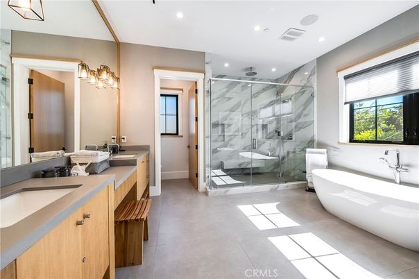 Bathroom, Dual Sink Vanities, Free Standing Baths, Glass Shower, Interior, Marble Walls, Recessed Lighting