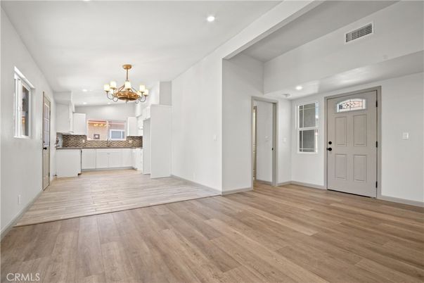 Chandelier, Empty room, Interior, Kitchen, Recessed Lighting, Wood Texture Flooring