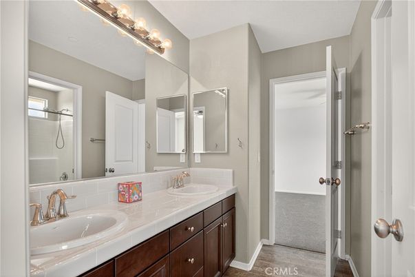 Bathroom, Dual Sink Vanities, Interior, Tile Countertops, Wood Texture Flooring