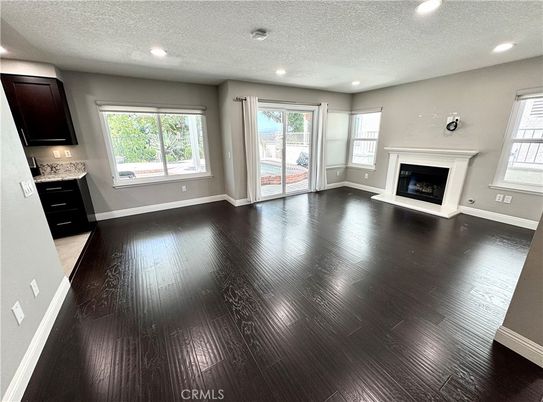 Empty room, Fireplace, Interior, Recessed Lighting, Wood Texture Flooring