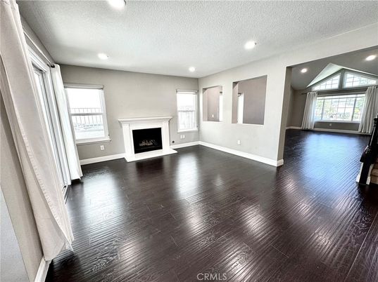 Empty room, Fireplace, Interior, Recessed Lighting, Wood Texture Flooring