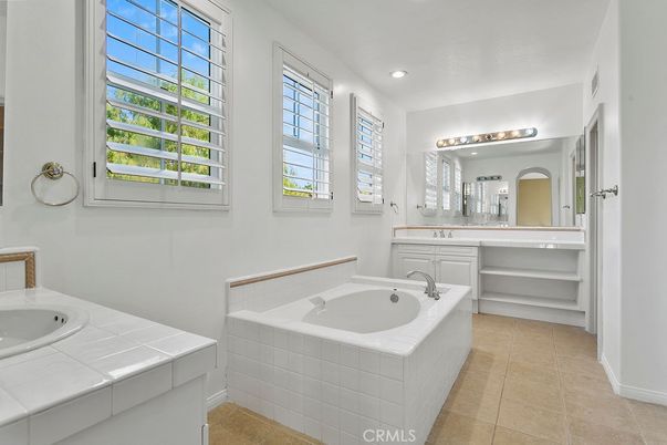Bathroom, Dual Sink Vanities, Interior, Recessed Lighting, Tile Countertops