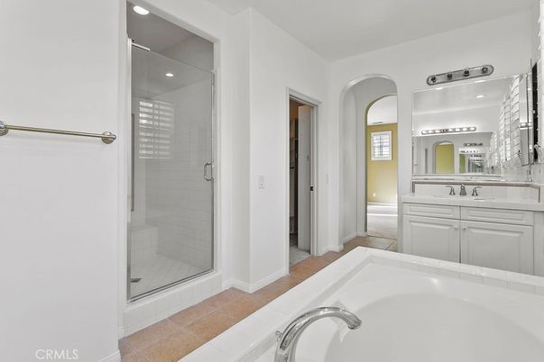 Bathroom, Dual Sink Vanities, Glass Shower, Interior, Recessed Lighting, Tile Countertops