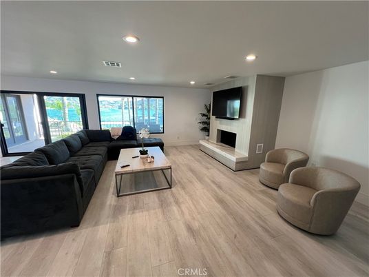 Fireplace, Interior, Living room, Recessed Lighting, Wood Texture Flooring