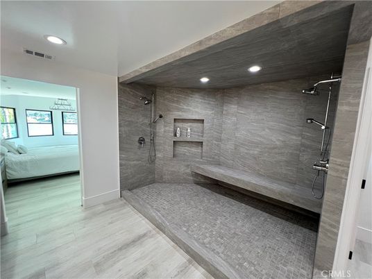 Bathroom, Bedroom, Glass Shower, Interior, Recessed Lighting, Wood Texture Flooring