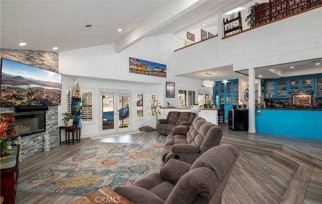 Chandelier, Fireplace, Interior, Living room, Recessed Lighting, Wood Texture Flooring