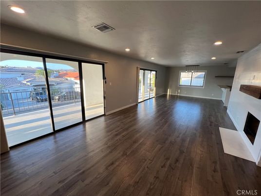Empty room, Fireplace, Interior, Pendant Lights, Recessed Lighting, Wood Texture Flooring