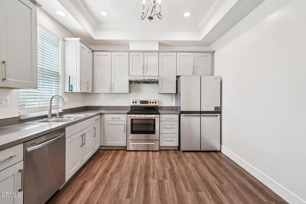 Interior, Kitchen, Recessed Lighting, Stainless Steel Appliances, Wood Texture Flooring