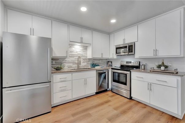 Interior, Kitchen, Recessed Lighting, Stainless Steel Appliances, Wood Texture Flooring